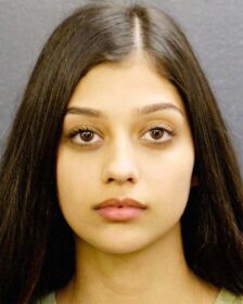 Identification photo of an attractive lady with fine dark hair