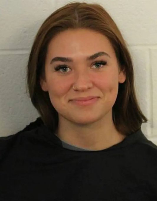 mugshot of a woman with a very beautiful and warm smile