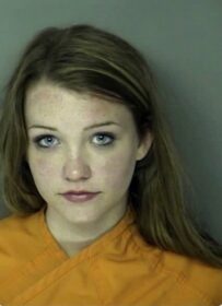 cute looking woman mugshot
