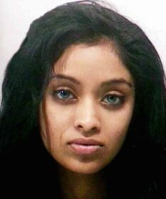 mugshot of a deep blue eyed attractive lady