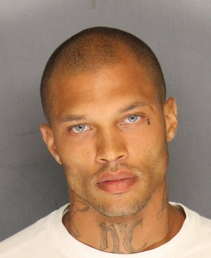 Mugshot of famous attractive guy with blue eyes