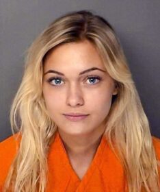 mugshot of a pretty blonde with a cute smile