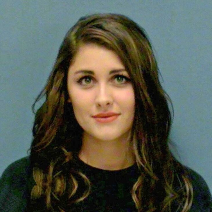 mugshot of a pretty woman with brown hair and nice smile